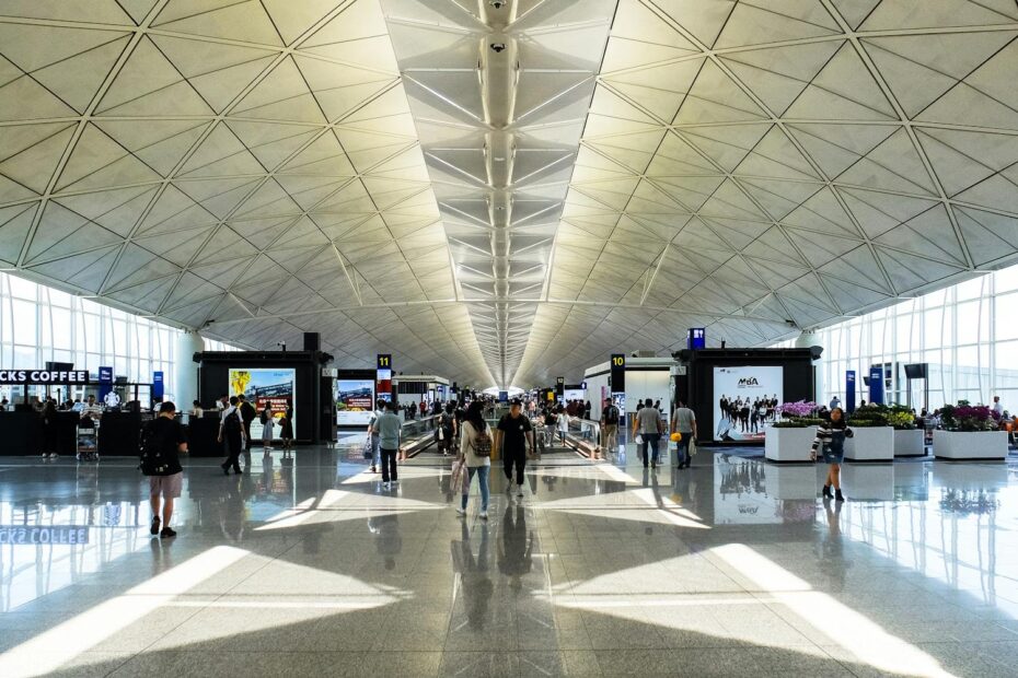 People at an airport waiting for their flight