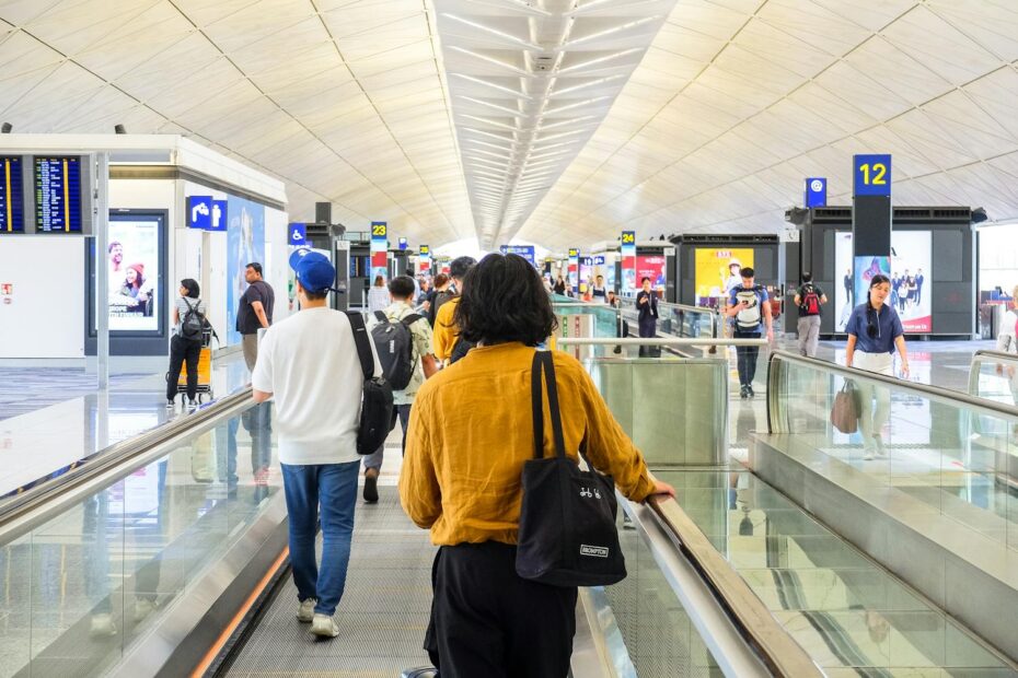 People at an international airport departures zone